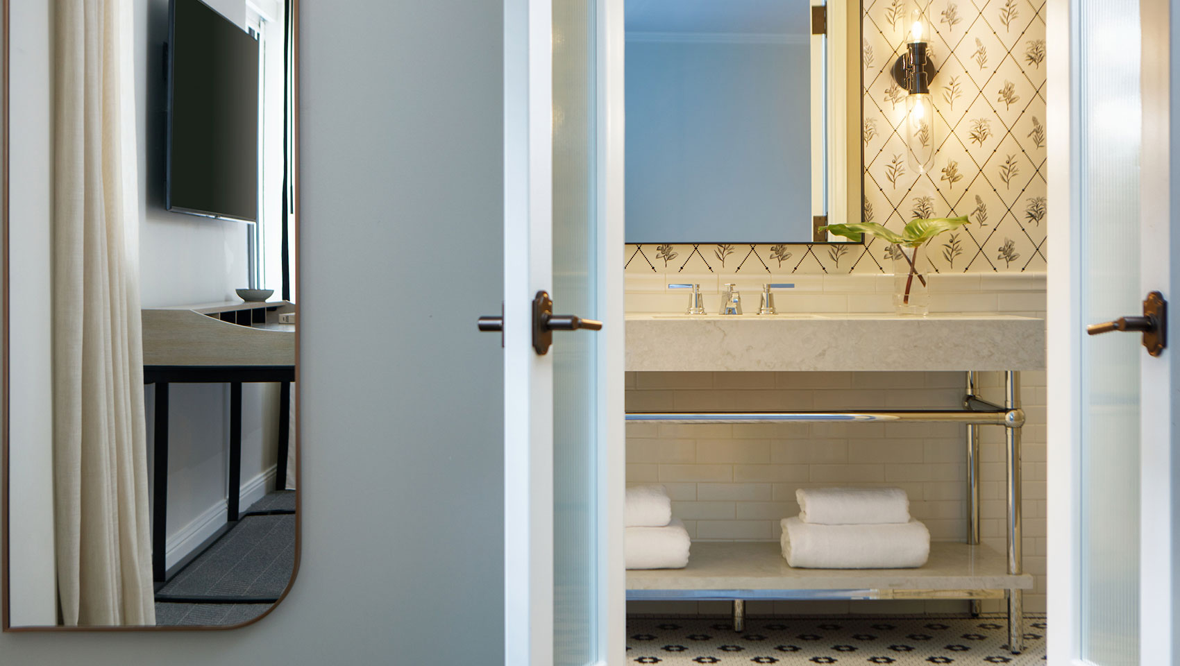 guestroom bathroom sink and mirror