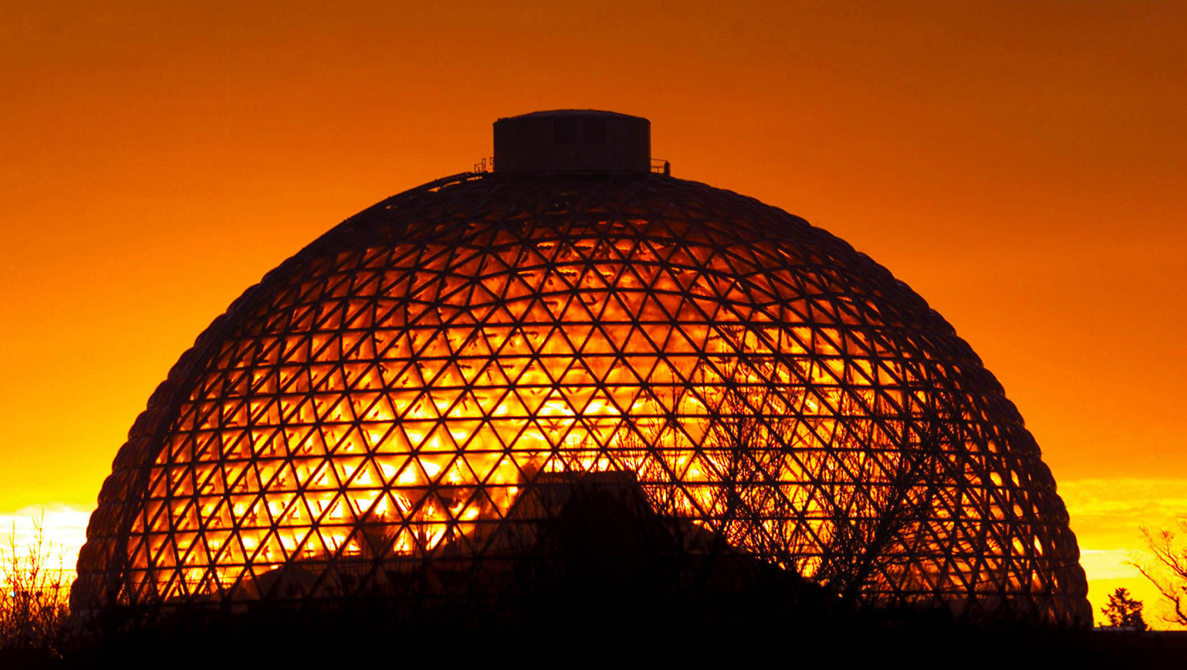 omaha zoo dome glowing orange from the sun