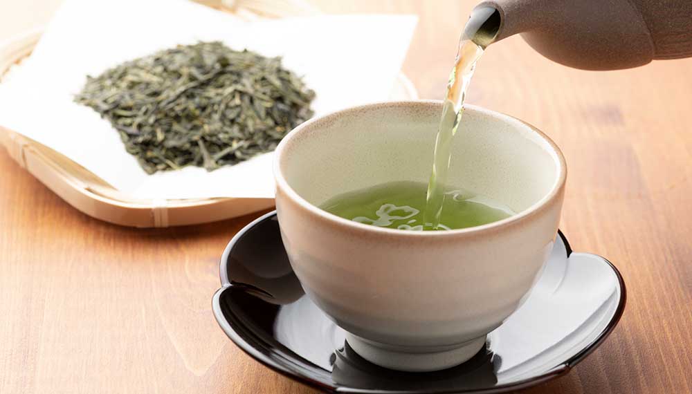 Pouring green tea